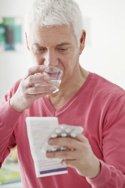 CHOLESTEROL TREATMENT, ELDERLY — Stock Photo, Image