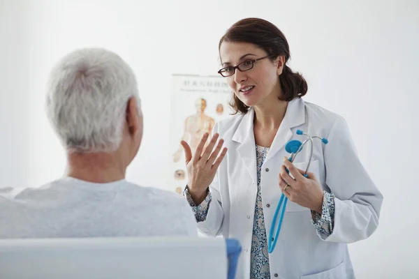 CONSULTA, ELDERLY P. IN DOIN — Foto de Stock