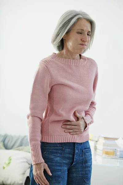 ABDOMINAL PAIN in ELDERLY PERSON — стоковое фото