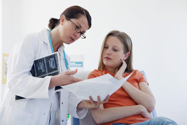 WOMAN IN CONSULTATION