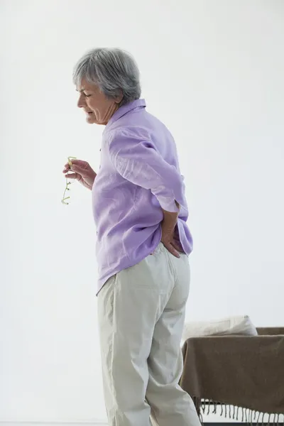 LOWER BACK PAIN IN ELDERLY PERS. — Stock Photo, Image