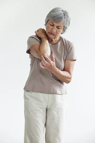 ELBOW PAIN IN AN ELDERLY PERSON — Stock Photo, Image