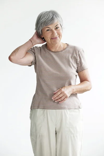 Porträt einer 65-jährigen Frau — Stockfoto