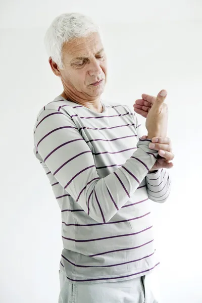 PAINFUL WRIST IN AN ELDERLY P. — Stock Photo, Image