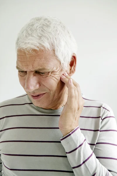 Ältere Person mit Zahnschmerzen — Stockfoto