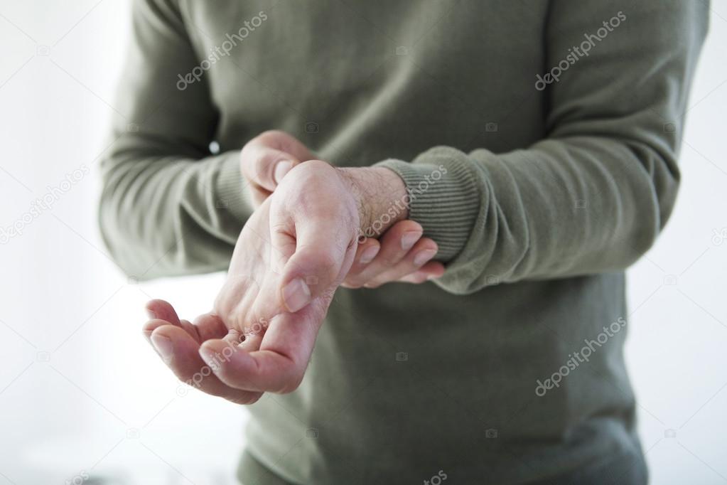 PAINFUL WRIST IN A MAN