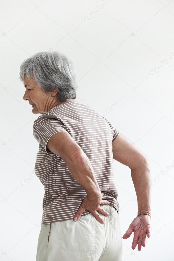 LOWER BACK PAIN IN ELDERLY PERS. Stock Photo by ©imagepointfr 44397211