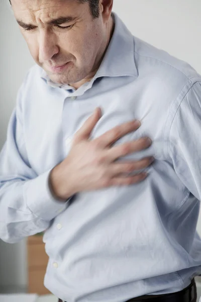 MAN WITH HEART ATTACK — Stock Photo, Image