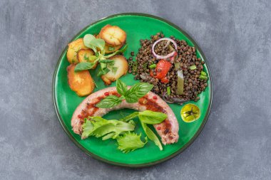 Lentils, potatoes and sausage.