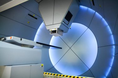 Proton therapy irradiates cancer cells with a beam of protons inside the tumor.