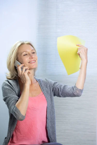 Menopausal Woman Having Hot Flush — Stockfoto