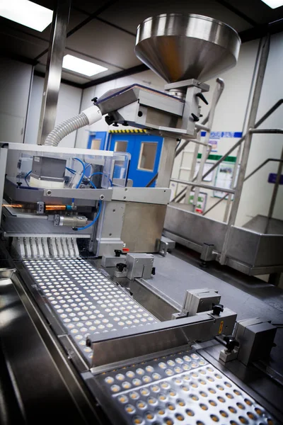 Pharmaceutical production unit specializing in the packaging and distribution of tablets. .