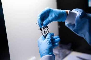 Pharmaceutical industry and manufacture of injectable preparations (pre-filled syringes) then manual verification of syringes.