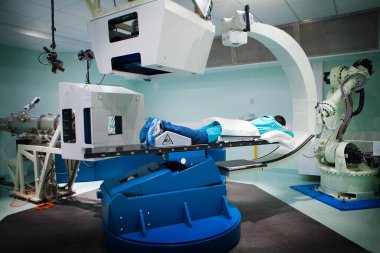 Oncological hadrontherapy for the treatment of cancer with hadrons, protons or carbon ions.