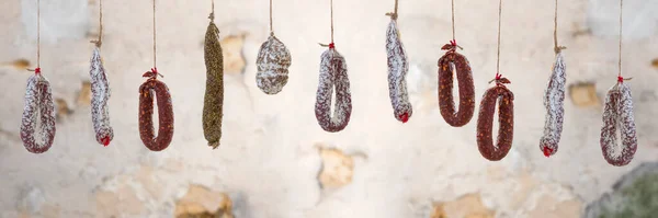 Dry Sausage Hanging Isolated Wall Background —  Fotos de Stock