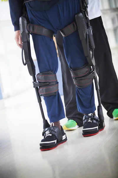 Post Stroke Neurological Rehabilitation Patient Paralysis Both Legs Using Bionic — Stockfoto