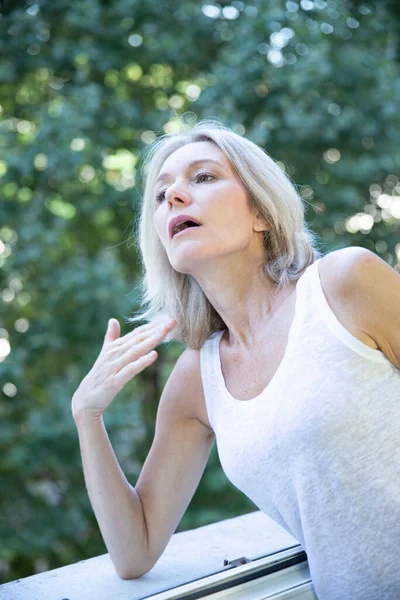 Menopausal Woman Having Hot Flush — Stock fotografie