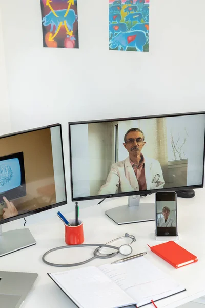 Teleconsultation Two Doctors Stem Cell One Screens — Stok fotoğraf