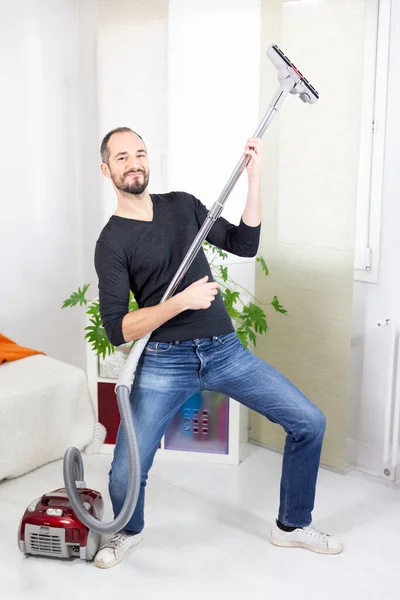 Man Pretending Guitarist Vacuum Cleaner — Fotografia de Stock