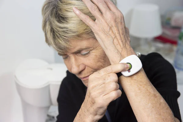 Elderly Woman Medical Alert System Her Wrist — Stok fotoğraf