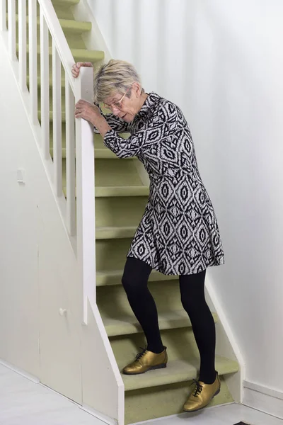 Elderly Woman Coming Stairs — Stock fotografie