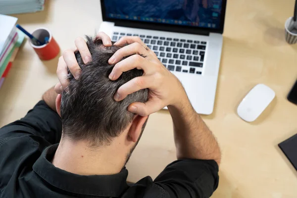 Man Holding His Head His Hands Front His Computer — Stok fotoğraf