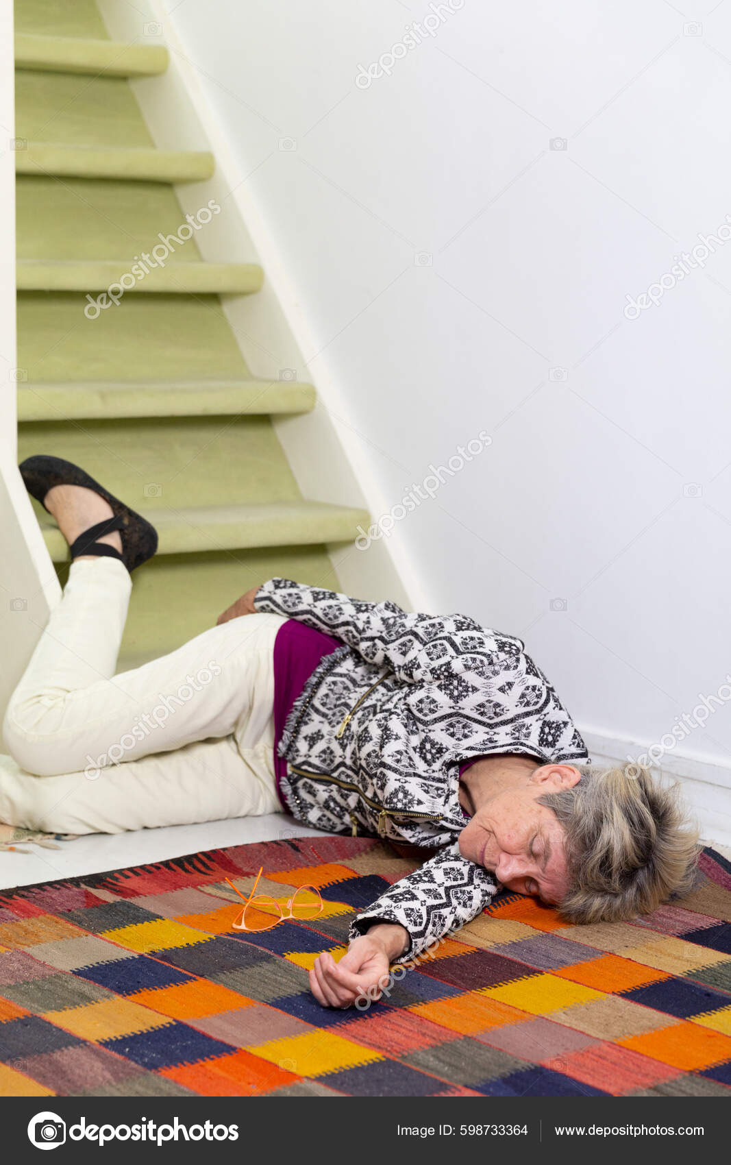 Elderly Woman Who Has Fallen Stairs Stock Photo by ©imagepointfr