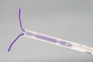 IUD  isolated on white background