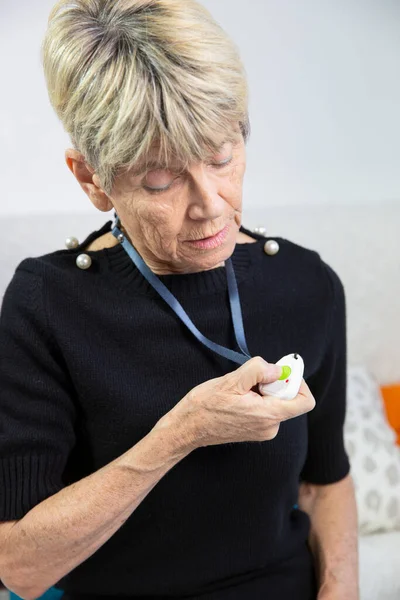 Elderly Woman Medical Alert System Her Neck — Photo