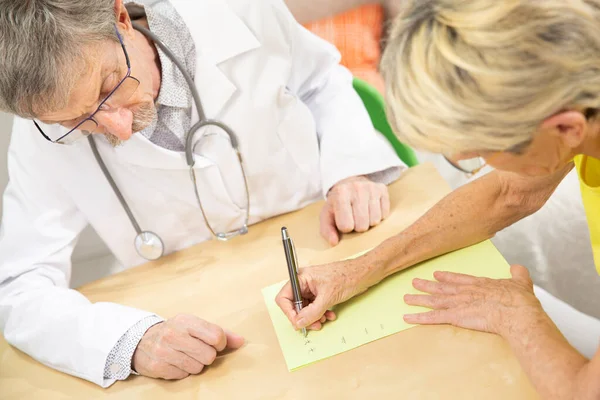 Physician Doing Writing Rehabilitation Woman Parkinson Disease — Stock Photo, Image