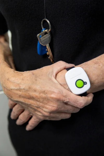 Elderly Woman Medical Alert System Her Wrist — Fotografie, imagine de stoc