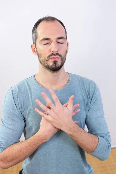 Man Carrying Out Relaxation Techniques —  Fotos de Stock