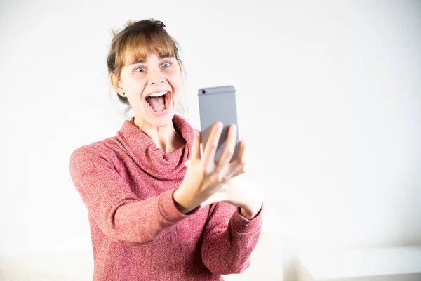 Extremely Joyful Woman Sight Her New Smartphone — Zdjęcie stockowe