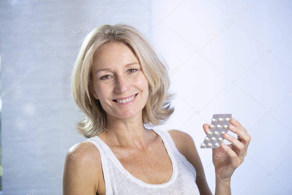A menopausal woman using HRT.