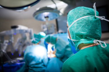 Operating room of a hospital with a robot surgeon.