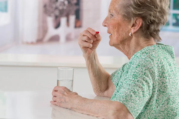 Senior Woman Taking Medicine — Stock Fotó