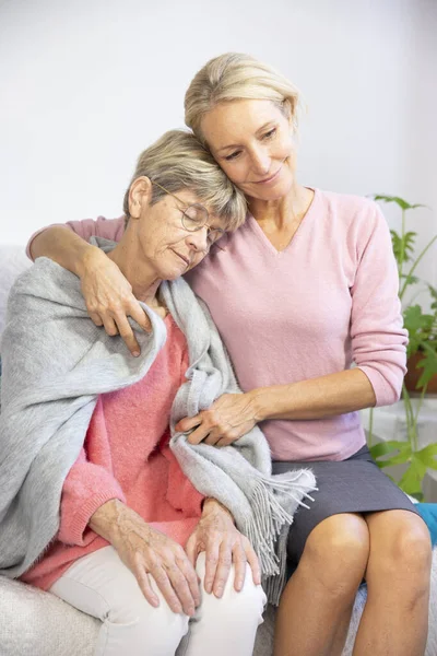Woman Her Fifties Putting Shawl Elderly Woman — Stockfoto