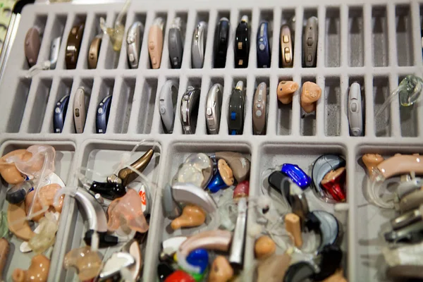 Choice of hearing aids from a hearing care professional.