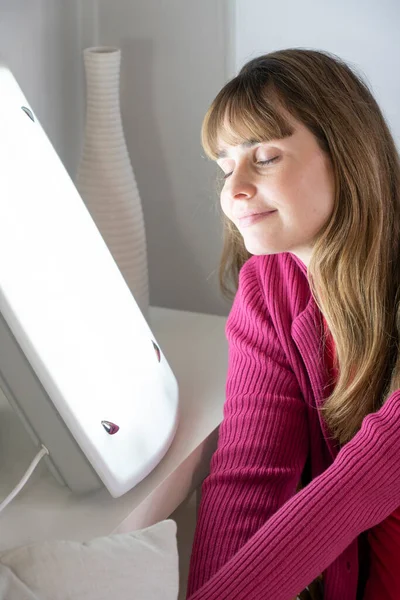 Woman Sitting White Light Lamp Light Therapy — Foto Stock