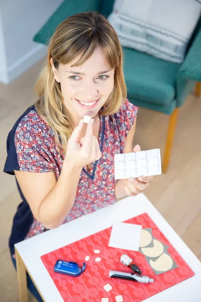 Woman Taking Lozenge Nicotine Substitute — Stok fotoğraf