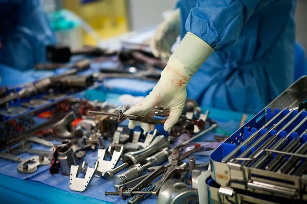Surgical instruments in an orthopedic surgery operating theater for knee prosthesis.