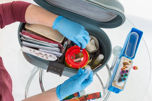 Nurse Organising Her First Aid Briefcase Medical Tools Assistance Equipment — Stock Photo, Image