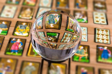 Fortune teller Crystal ball and in transparency tarot cards