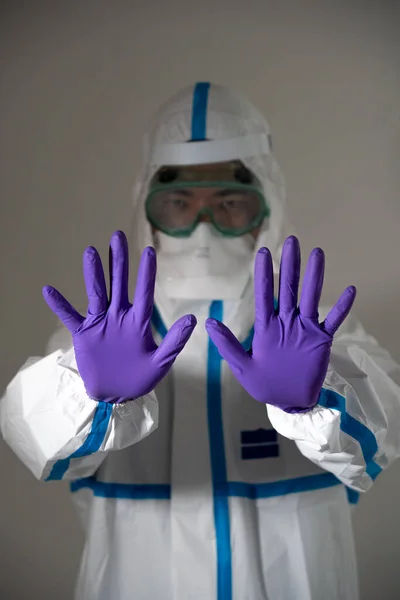Man in protective suit during the Covid-19 pandemic
