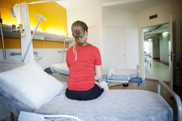 Patient Sitting Bed Arriving Hospital Room — Foto Stock