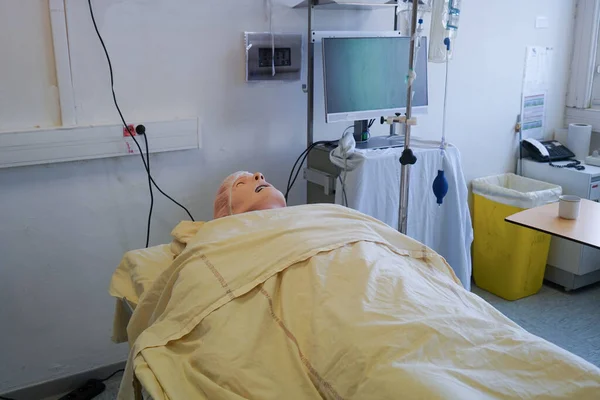 Anesthesiologist students during a critical situation resuscitation exercise at the Nimes Faculty of Medicine. Students train on a Sim Man 3 G robotic dummy.