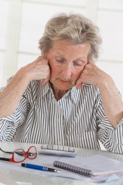 Senior Woman Doing Paperwork — 图库照片