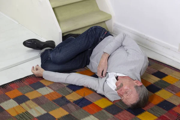 Elderly Man Who Has Fallen Stairs — Stockfoto