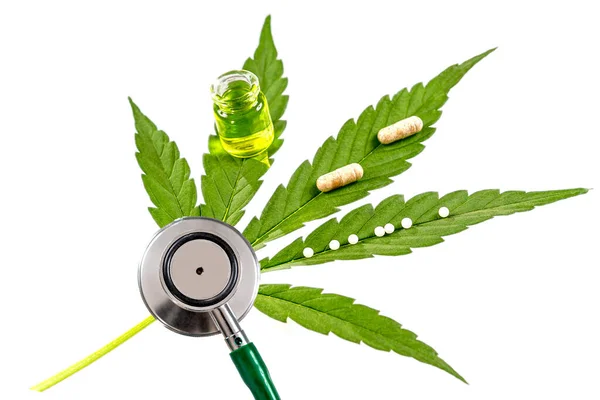 Close Stethoscope Capsules Oil Lying Cannabis Leaf Isolated White Background — 스톡 사진