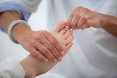 Chinese medicine practice, plantar reflexology session.
